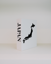 White box with black map of Japan and 'JAPAN' text on a white background