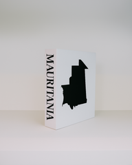 White box with black silhouette of Mauritania and 'MAURITANIA' text on a white background