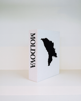 White book with black map of Moldova on a white background