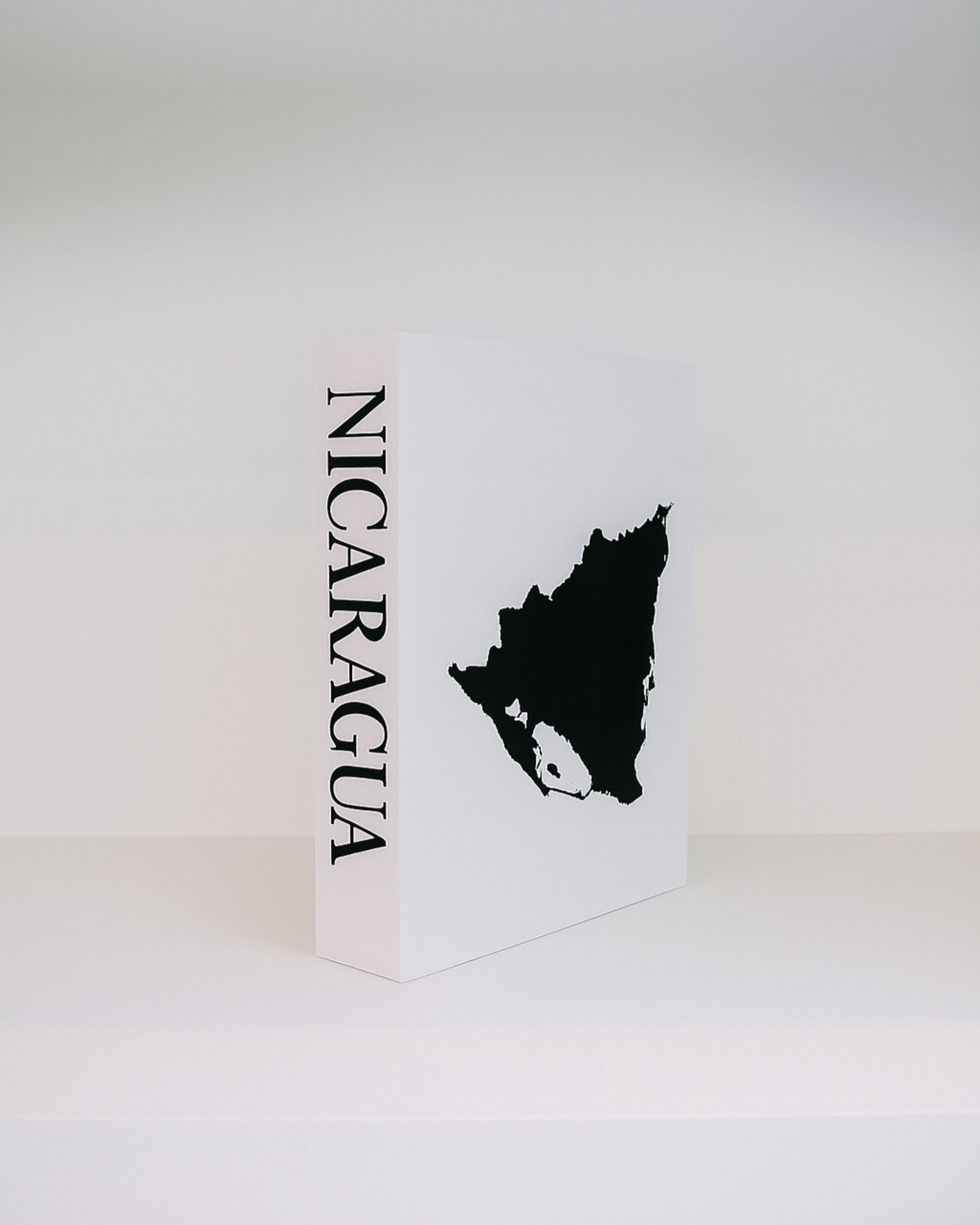 White box with a black map of Nicaragua on a white background