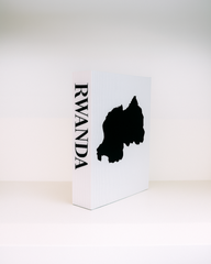 White box with black silhouette of Rwanda and 'RWANDA' text on a white background