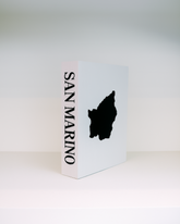 White box with black silhouette of San Marino on a white background