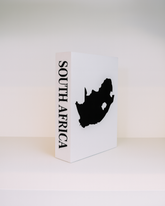 White box with a black silhouette of South Africa and 'South Africa' text on a white background