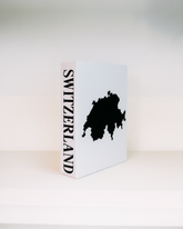 White box with black map of Switzerland on a white background