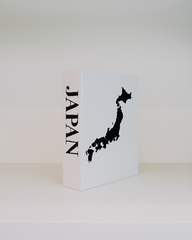 White box with black map of Japan and 'JAPAN' text on a white background