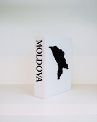 White book with black map of Moldova on a white background