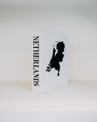 Card with a black silhouette of the Netherlands and 'Netherlands' text on a white background
