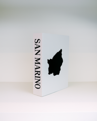 White box with black silhouette of San Marino on a white background