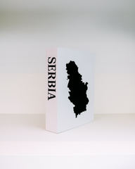 Book with a map of Serbia on a white background