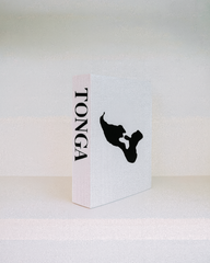 White box with 'Tonga' text and black silhouette on a white background